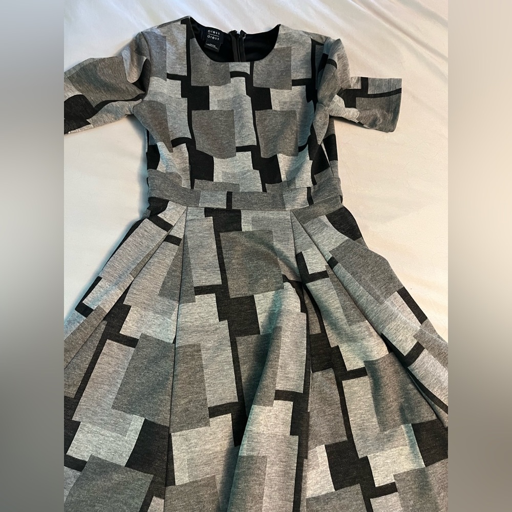 Dress, hits at knees. Super comfortable